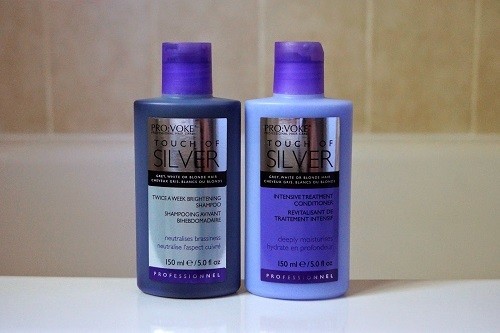 Bottles Of Purple Shampoo And Conditioner